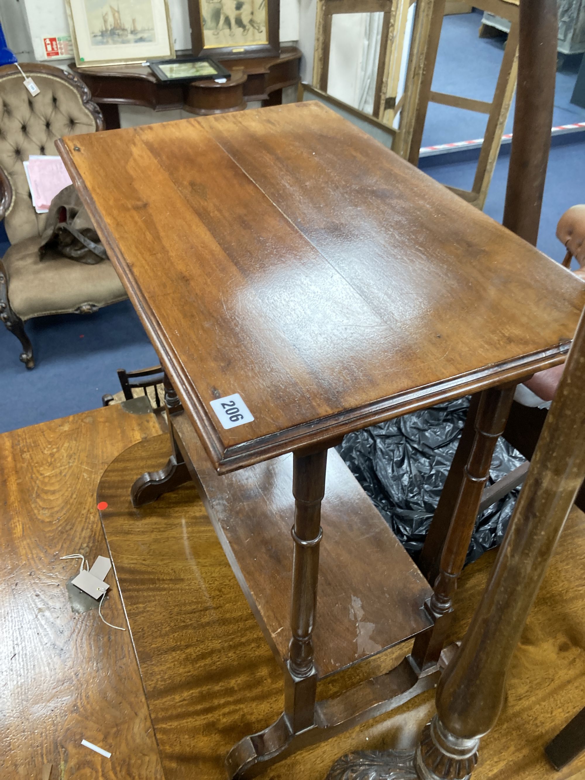 A 1920s mahogany tripod oil lamp standard, height 115cm and a two tier occasional table